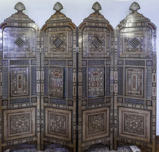 A screen with colorful woodwork attributed to Sultan Abdulhamid II.