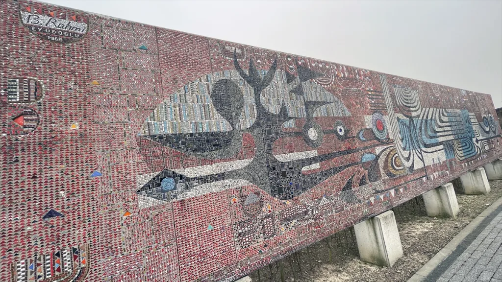 Turkish artist Bedri Rahmi Eyüboğlu designed a mosaic panel for the NATO Headquarters in Paris, gifted by Turkey in 1960. Initially displayed at the Palais de l'OTAN, NATO’s first permanent headquarters, the mosaic was eventually relocated to the new headquarters in Brussels.